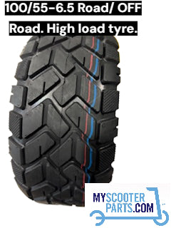 Tire with tread pattern on a white background, featuring text about tire size and load rating.